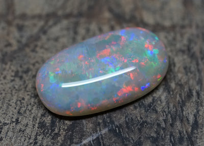 Olympic Pendant Oval Gem Opal - Red and Blue - 8.2 Carats. 0080