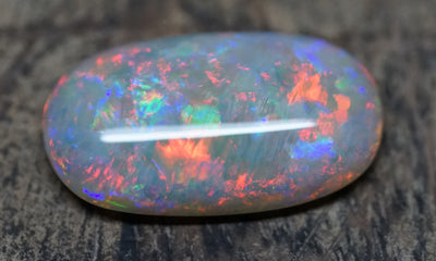 Olympic Pendant Oval Gem Opal - Red and Blue - 8.2 Carats. 0080