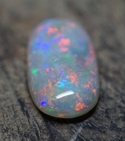 Olympic Pendant Oval Gem Opal - Red and Blue - 8.2 Carats. 0080