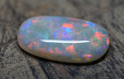 Olympic Pendant Oval Gem Opal - Red and Blue - 8.2 Carats. 0080