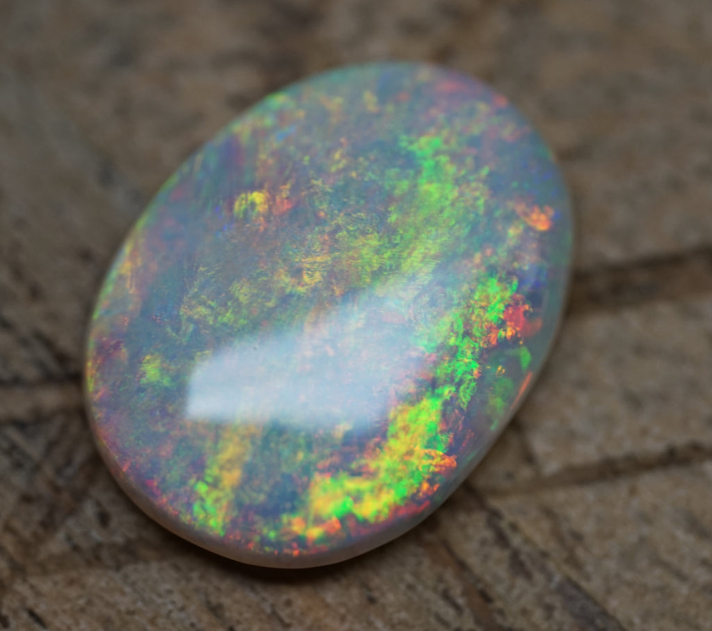 Bright Golden Oval with Red Hues - 5.4 Carats. 0010