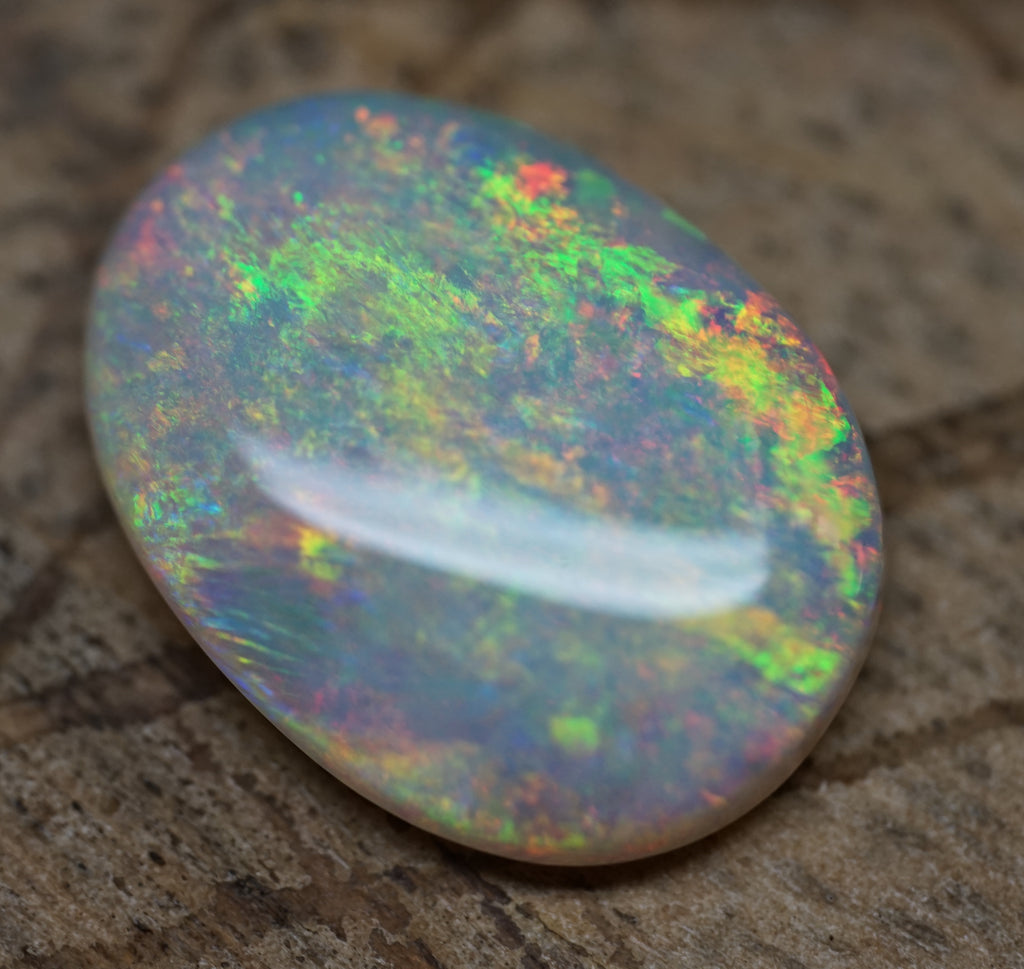 Bright Golden Oval with Red Hues - 5.4 Carats. 0010