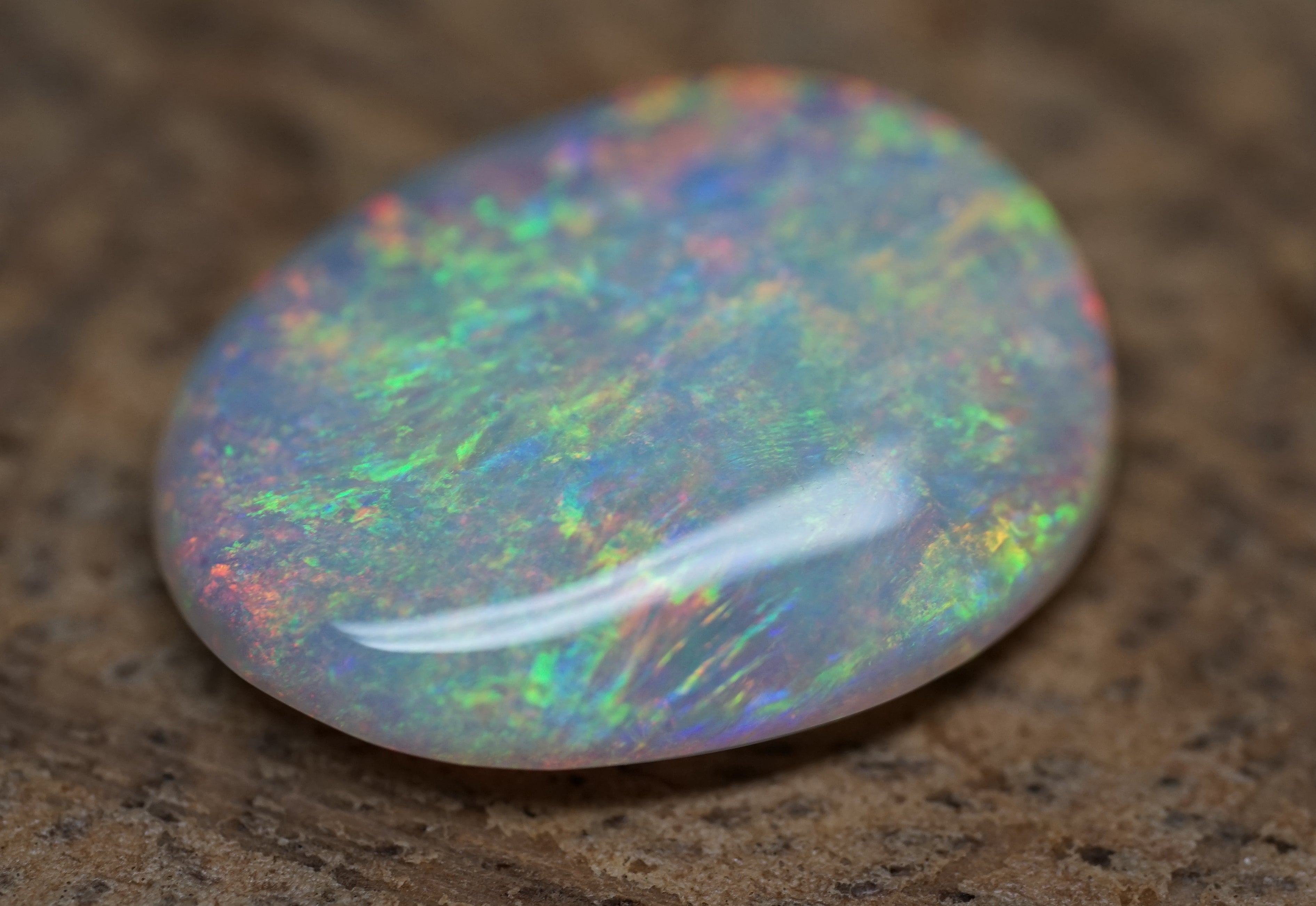 Bright Golden Oval with Red Hues - 5.4 Carats. 0010