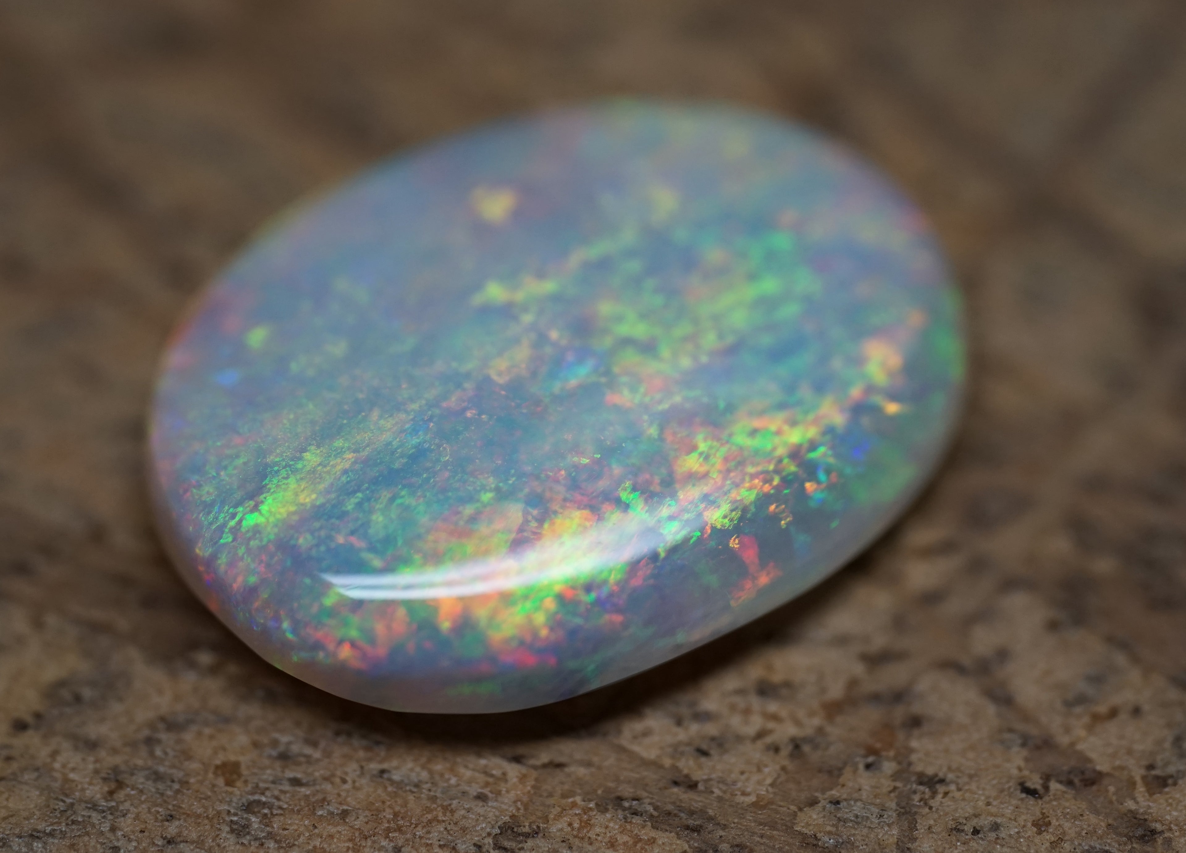 Bright Golden Oval with Red Hues - 5.4 Carats. 0010