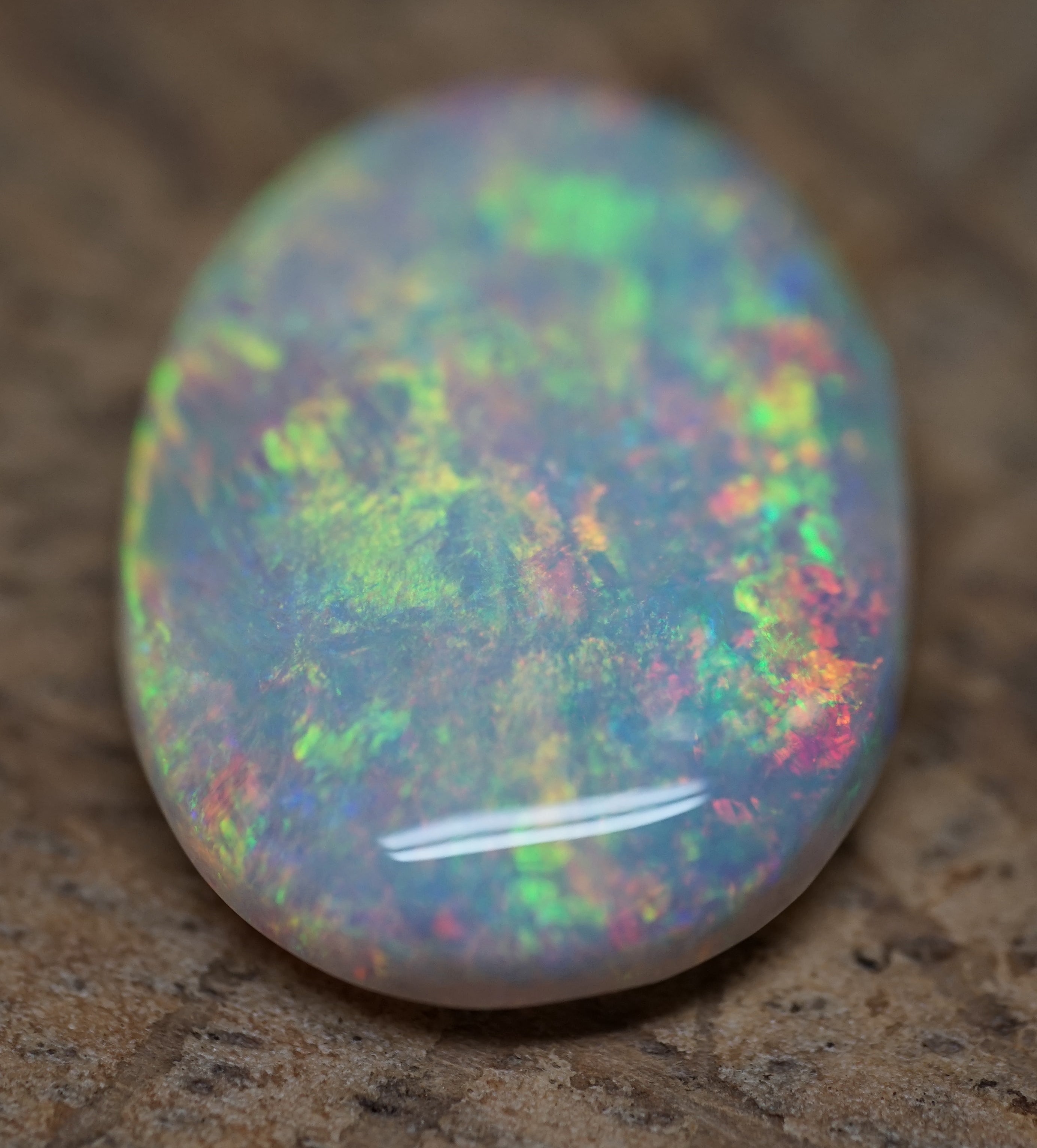 Bright Golden Oval with Red Hues - 5.4 Carats. 0010