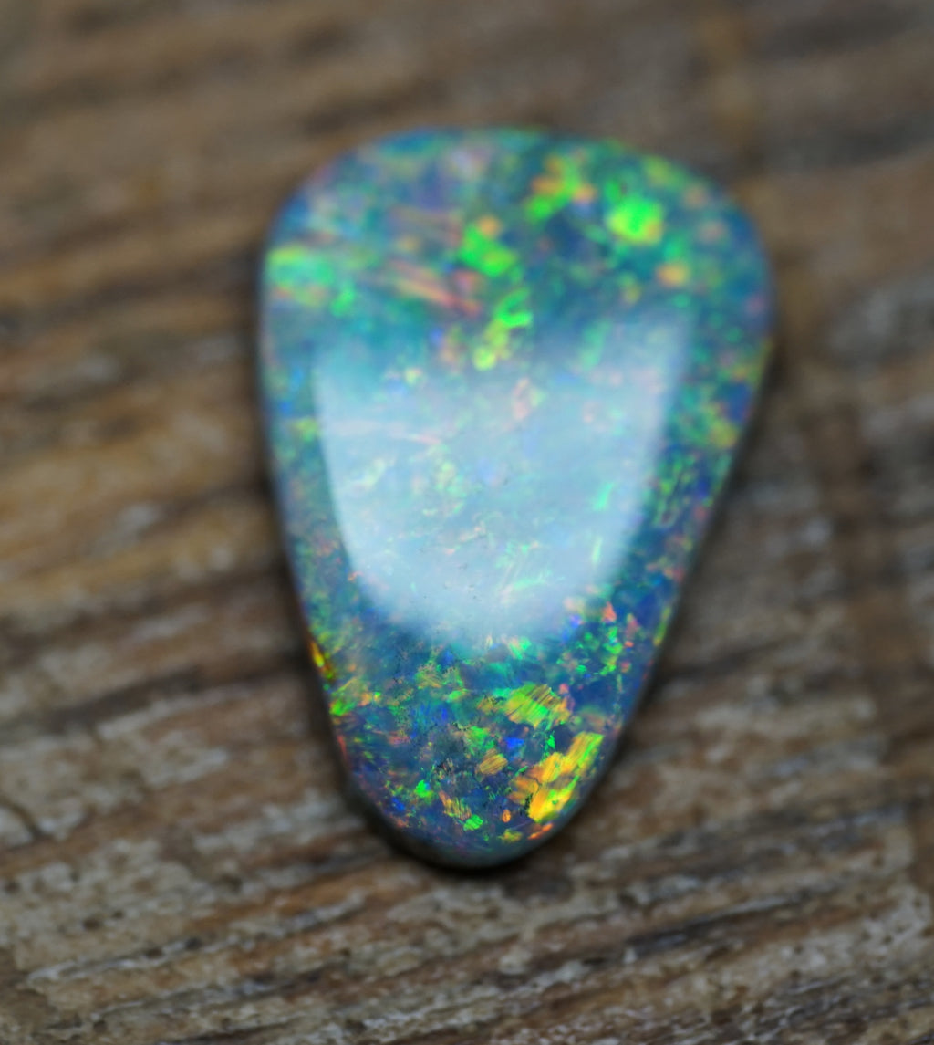 Coober Pedy Triangular Cut Black Opal - 1.6 Carats. 0028