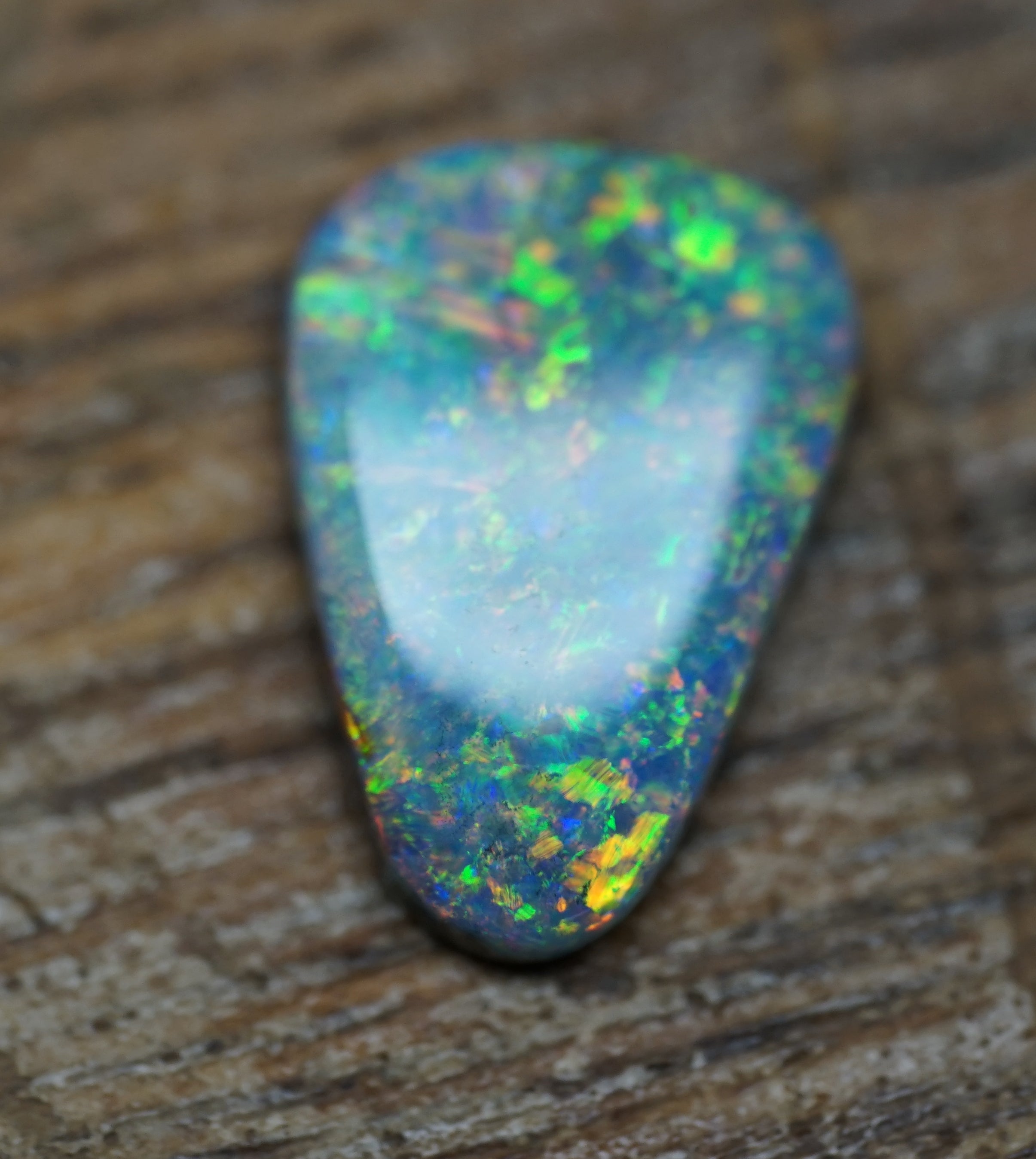 Coober Pedy Triangular Cut Black Opal - 1.6 Carats. 0028