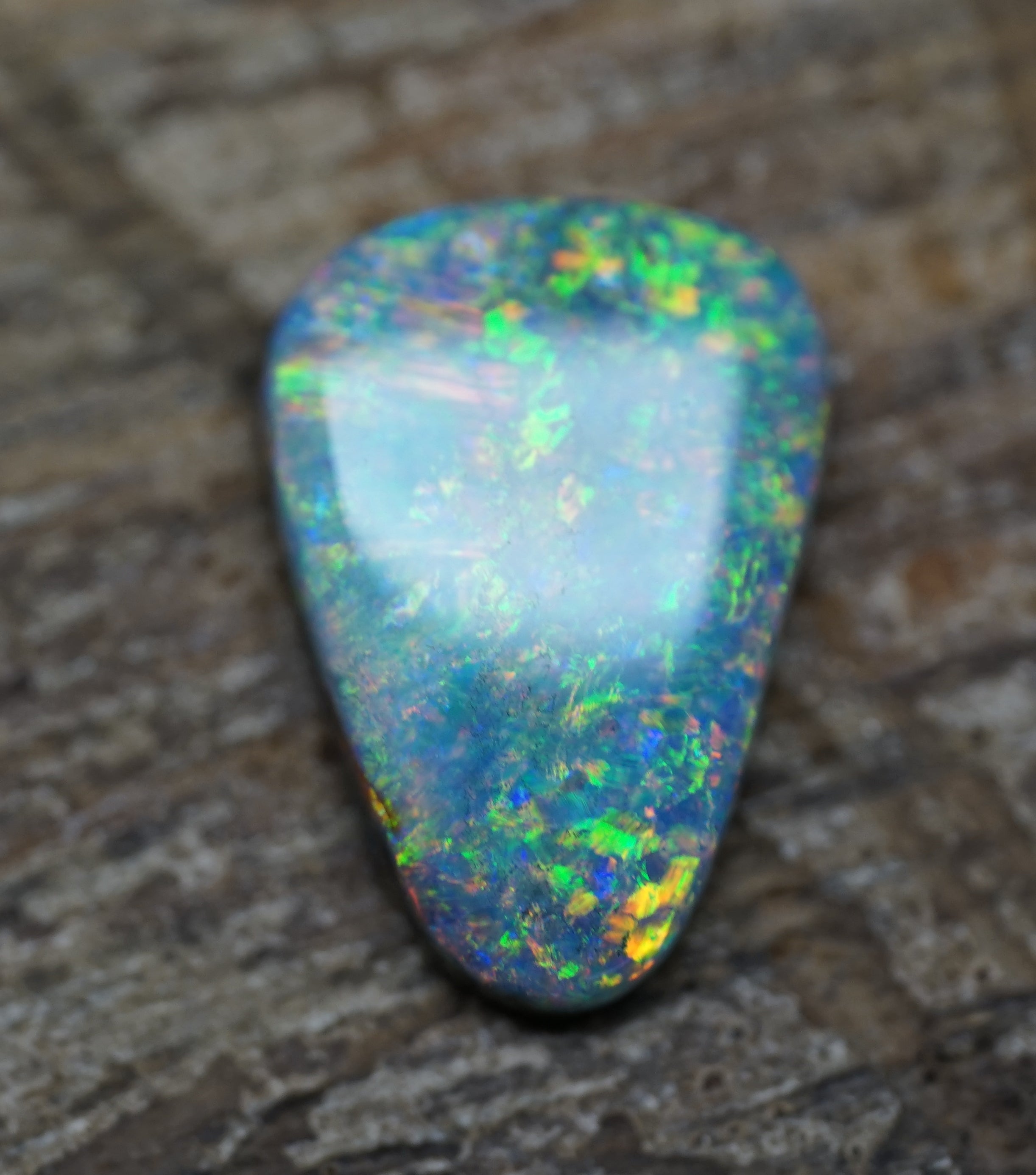 Coober Pedy Triangular Cut Black Opal - 1.6 Carats. 0028