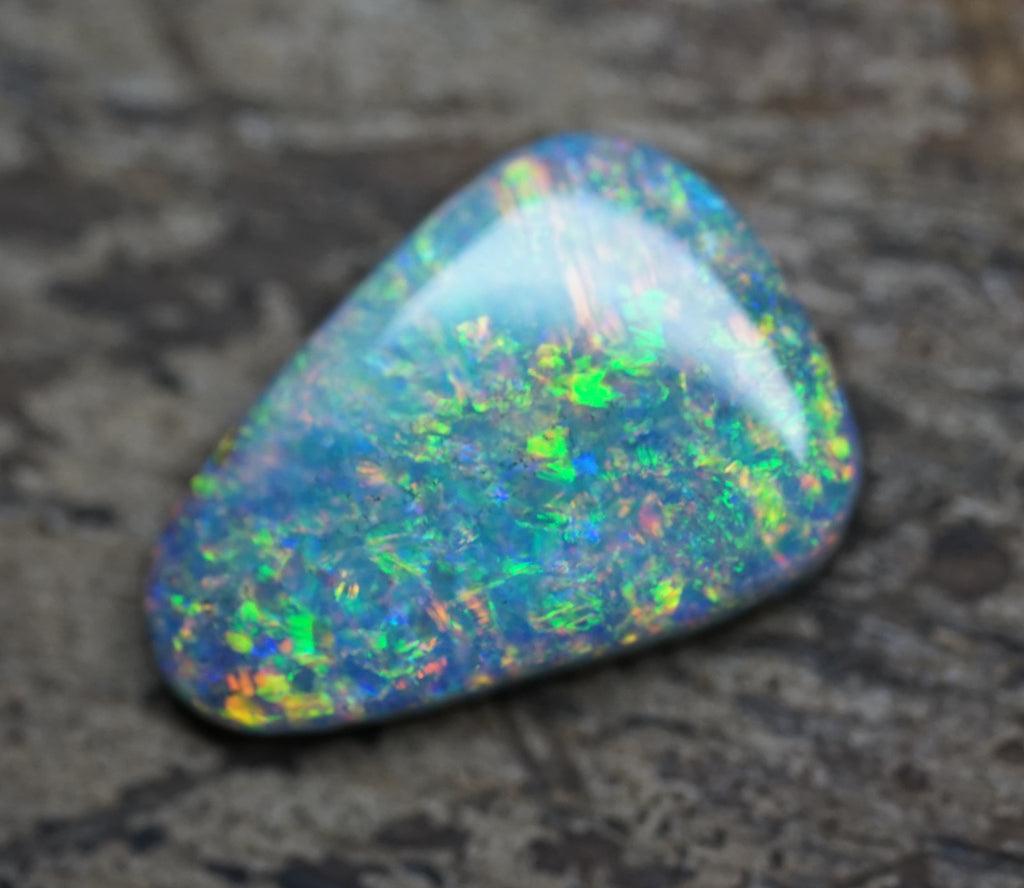 Coober Pedy Triangular Cut Black Opal - 1.6 Carats. 0028
