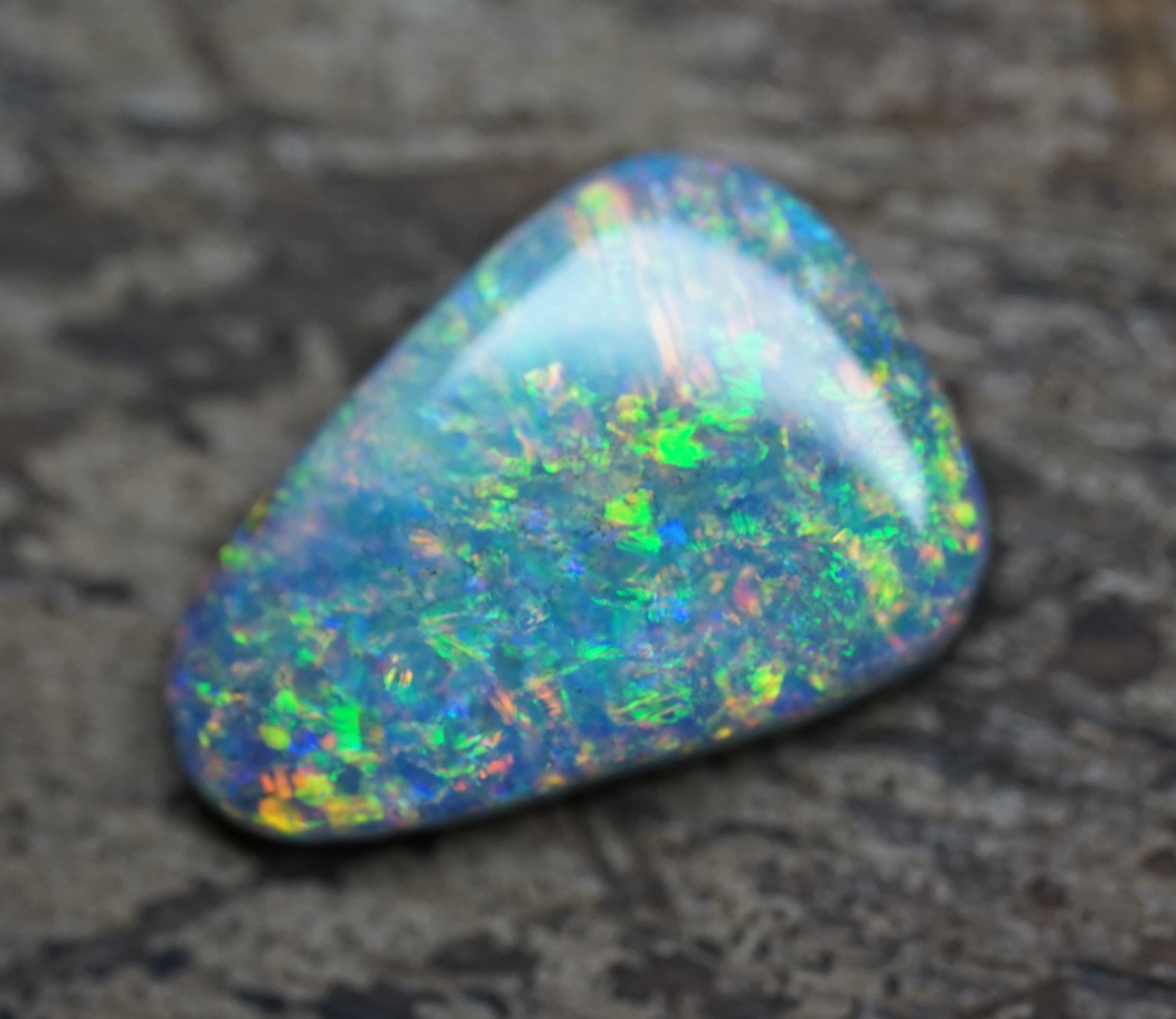 Coober Pedy Triangular Cut Black Opal - 1.6 Carats. 0028