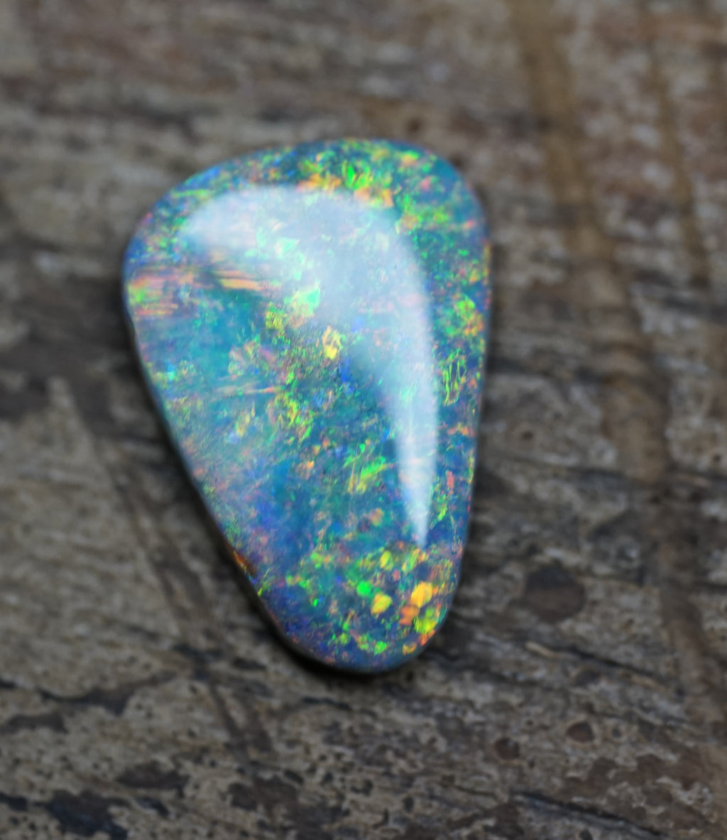 Coober Pedy Triangular Cut Black Opal - 1.6 Carats. 0028