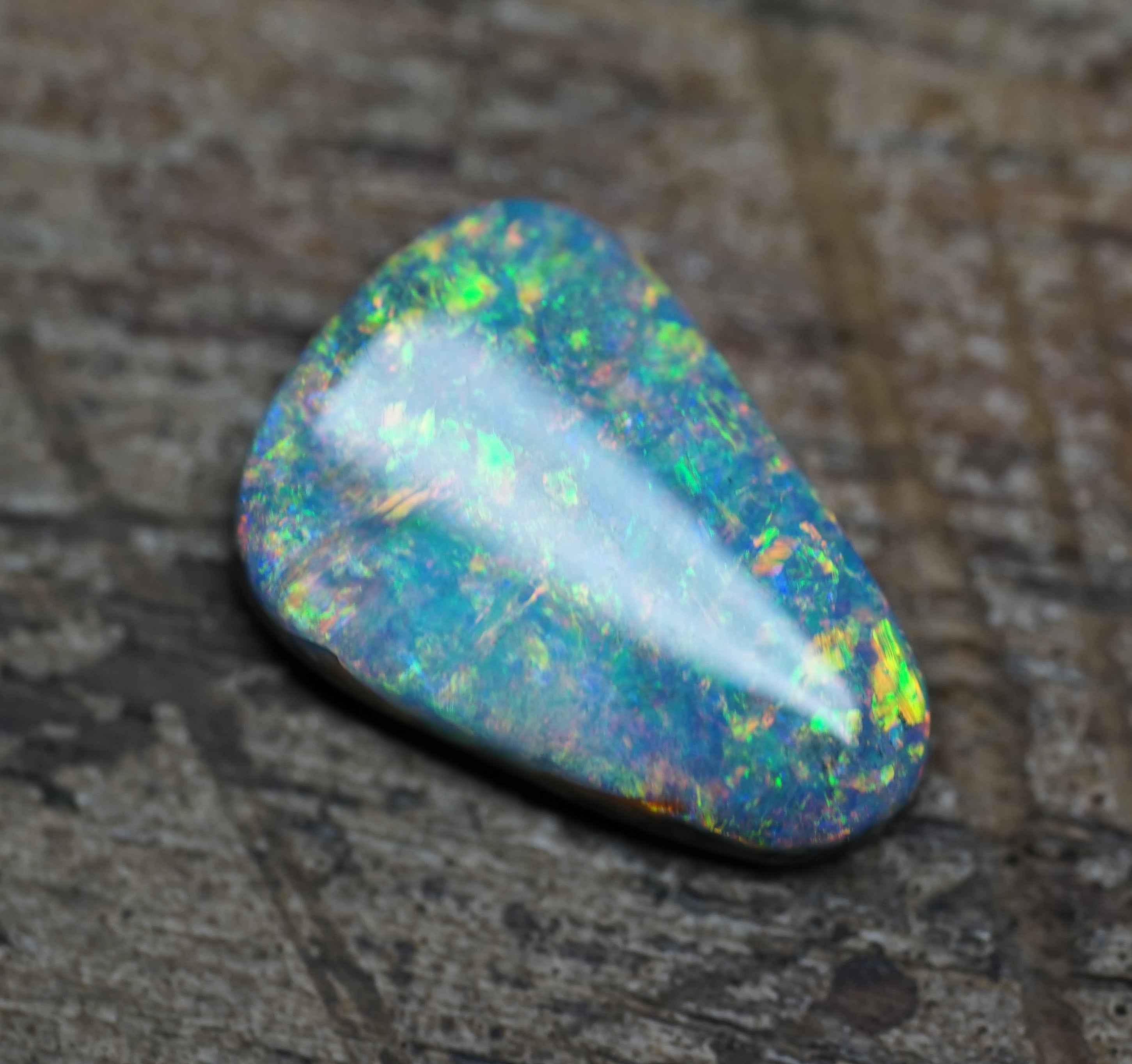 Coober Pedy Triangular Cut Black Opal - 1.6 Carats. 0028