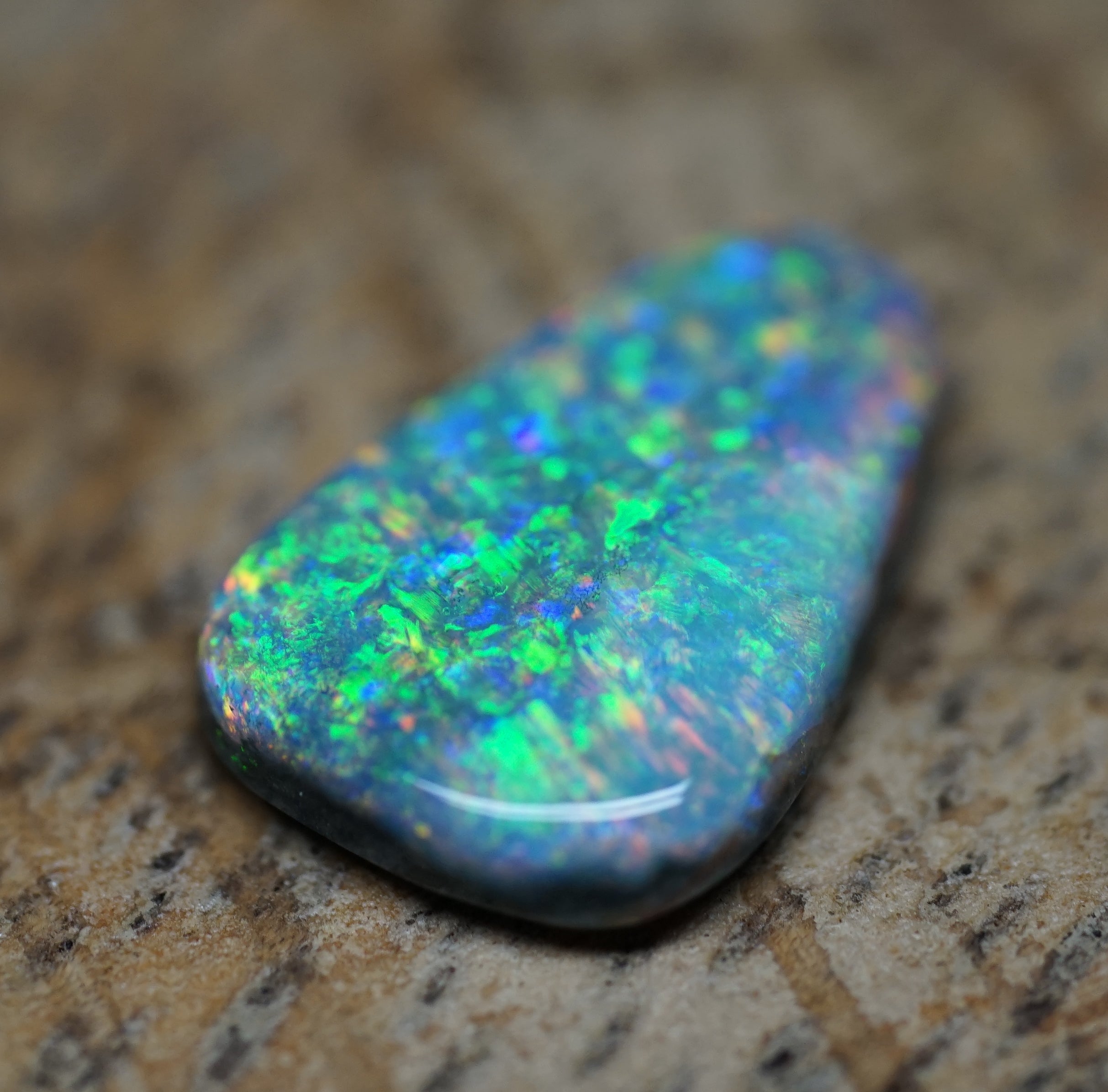 Coober Pedy Triangular Cut Black Opal - 1.6 Carats. 0028