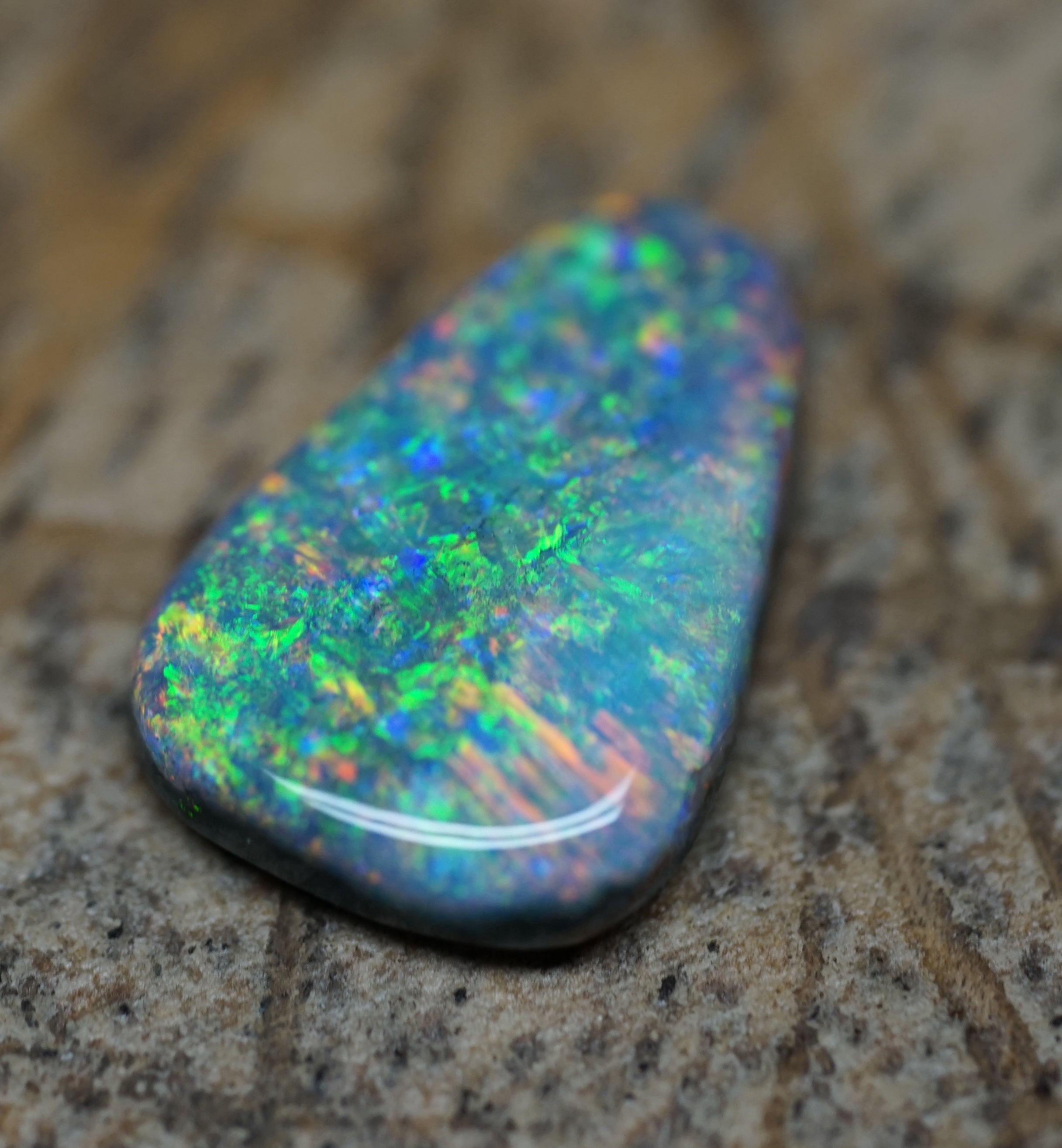 Coober Pedy Triangular Cut Black Opal - 1.6 Carats. 0028