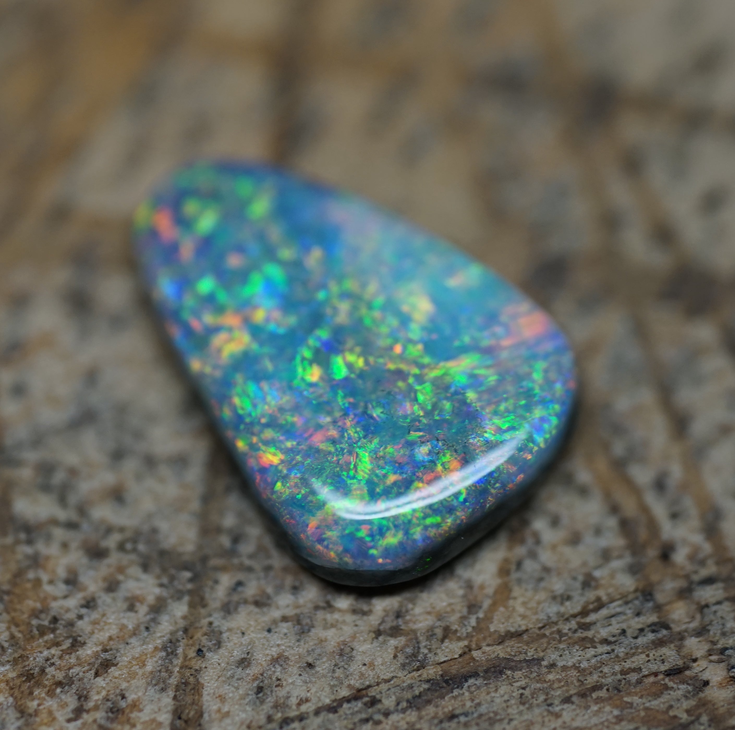 Coober Pedy Triangular Cut Black Opal - 1.6 Carats. 0028