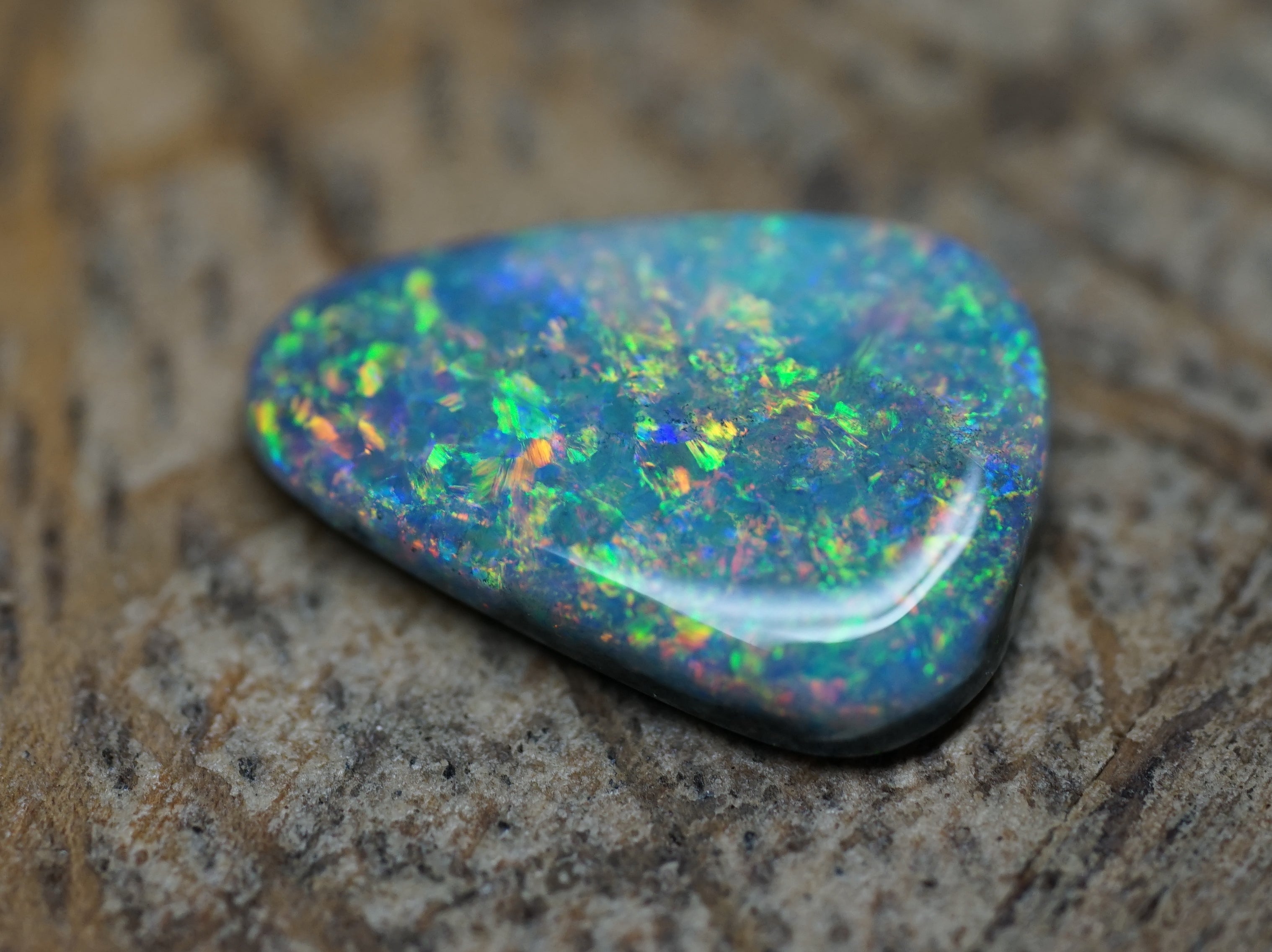 Coober Pedy Triangular Cut Black Opal - 1.6 Carats. 0028