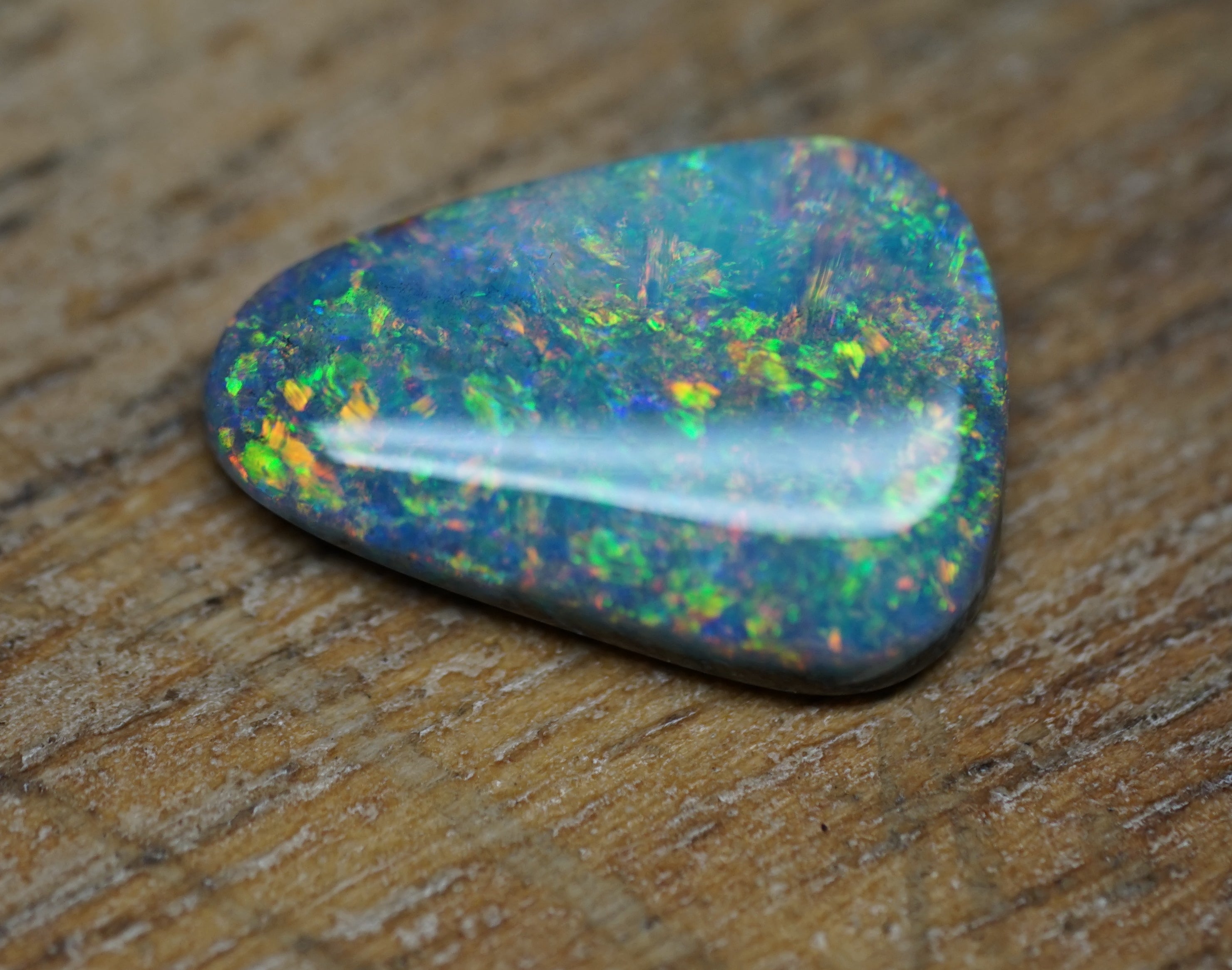Coober Pedy Triangular Cut Black Opal - 1.6 Carats. 0028